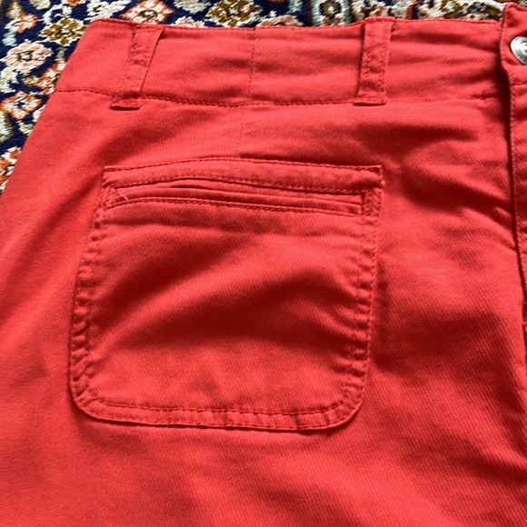 Light orange jean skirt with front and back pockets w/attached stretch shorts. - Picture 2 of 12